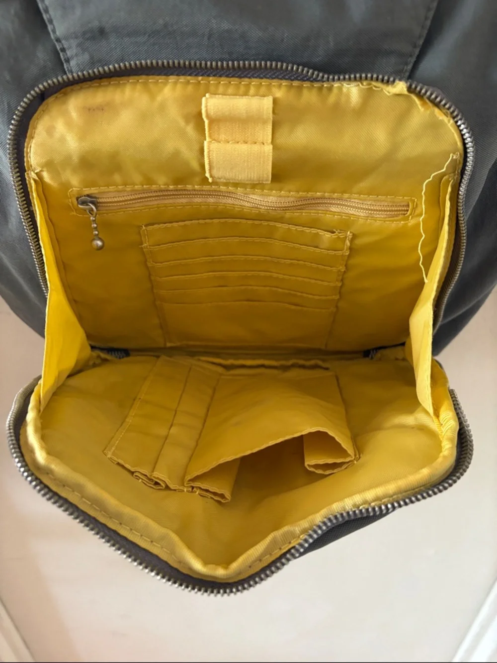 Baggalini Brussels Gray Crossbody Bag with O-Rings, Double Strap & Yellow Lining